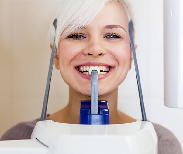 Woman receiving 3 D C T cone beam x-rays