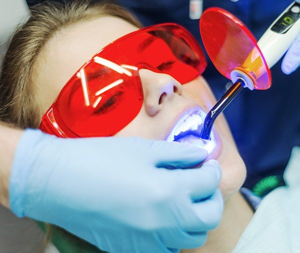 Patient receiving cosmetic dental bonding