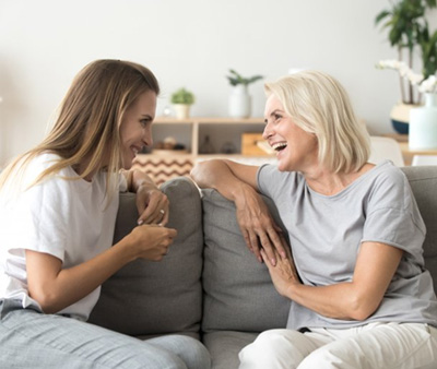 Ladies converse on couch