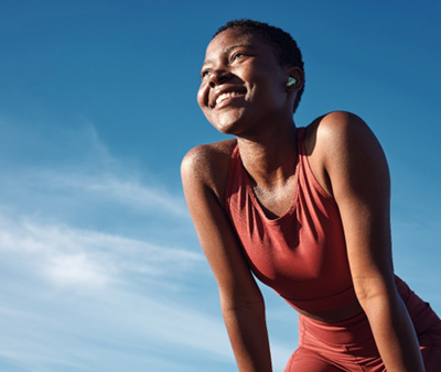Lady smiles outdoors