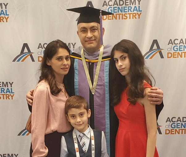 Doctor Albeer and his family at his dental school graduation