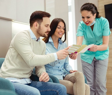 Dental staff discussing treatment in Carrollton