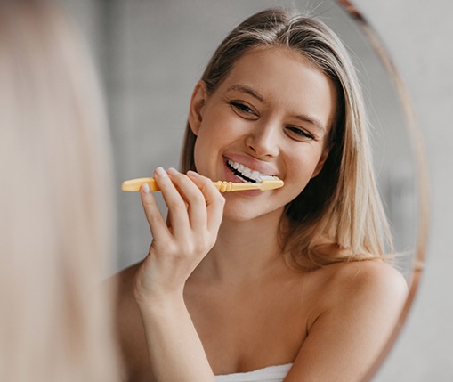Woman brushing her teeth