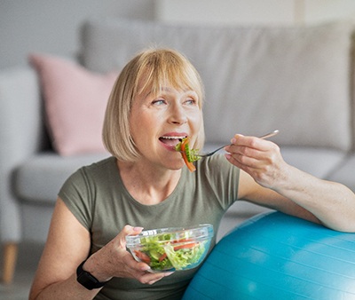 Woman eating a salad