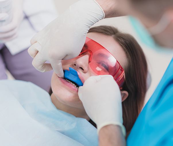 Patient receiving fluoride treatment