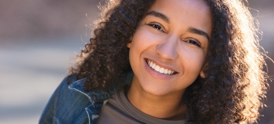 Young woman smiling after preventive dentistry