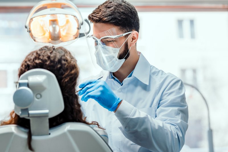 Dentist working on patient