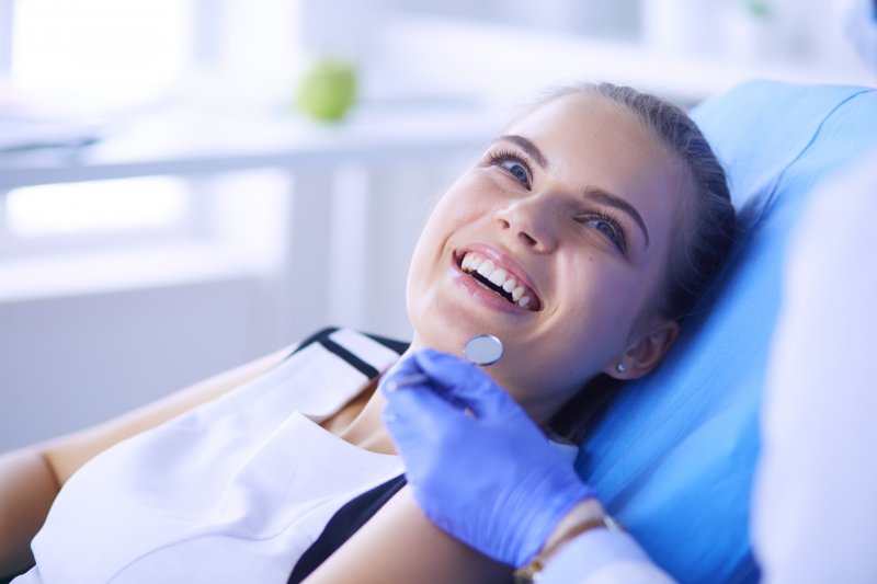 closeup of person smiling after getting tooth-colored fillings 