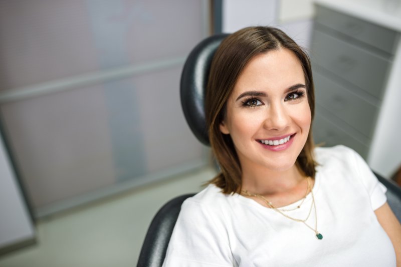 patient smiling after wisdom tooth extraction